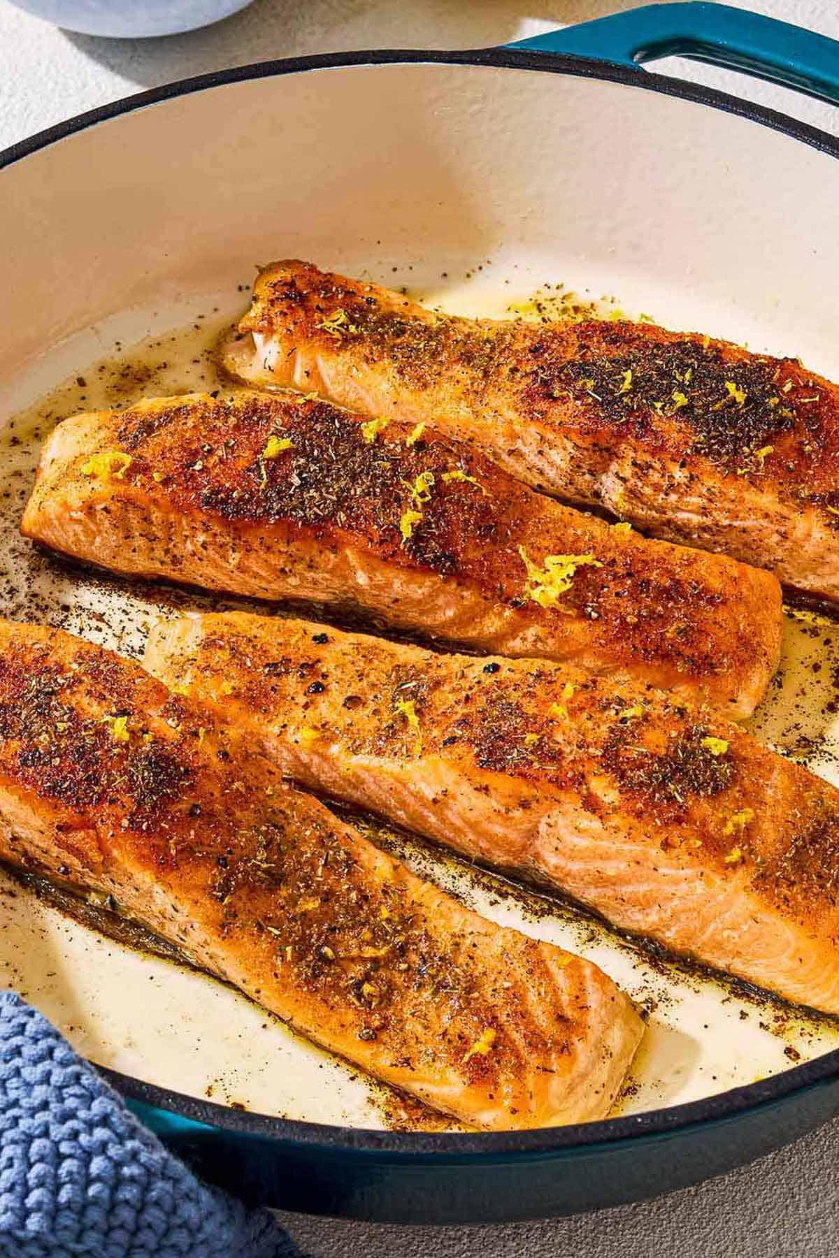 Close-up of crispy skin salmon being pan-seared