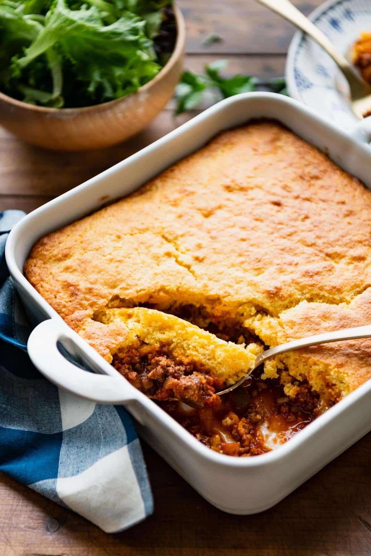 Close-up shot of a warm slice of cornbread casserole