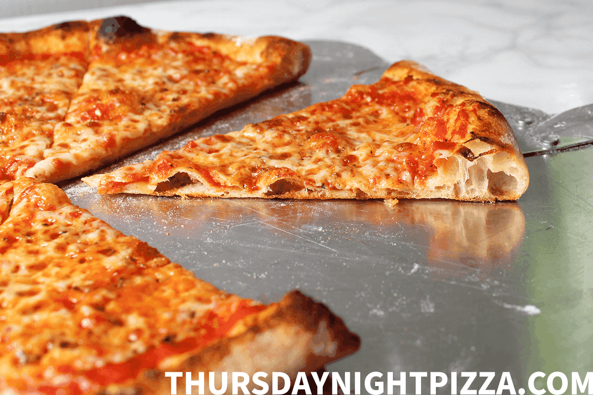 New York-style pizza with thin crust and classic toppings