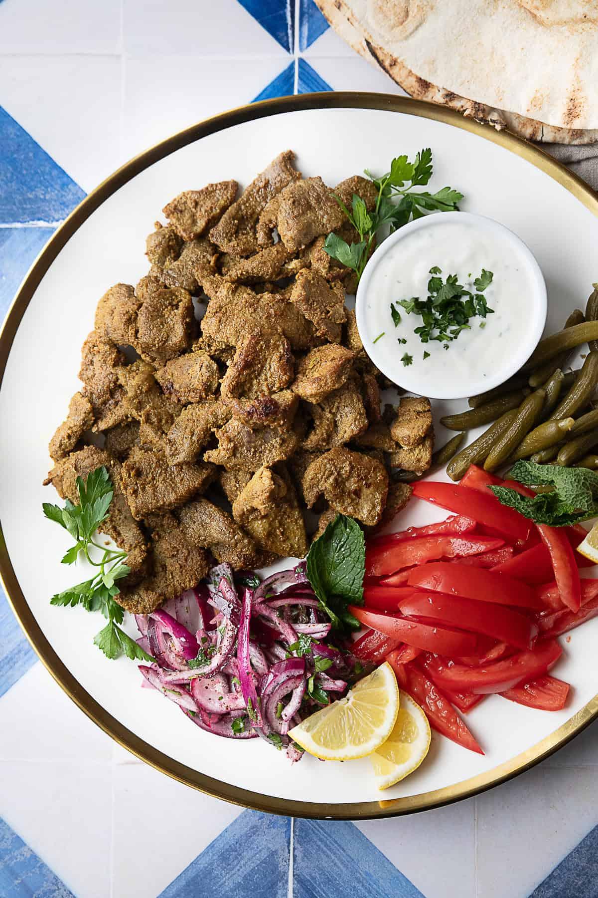 Close-up of the lamb shawarma, highlighting the spices and the texture of the meat