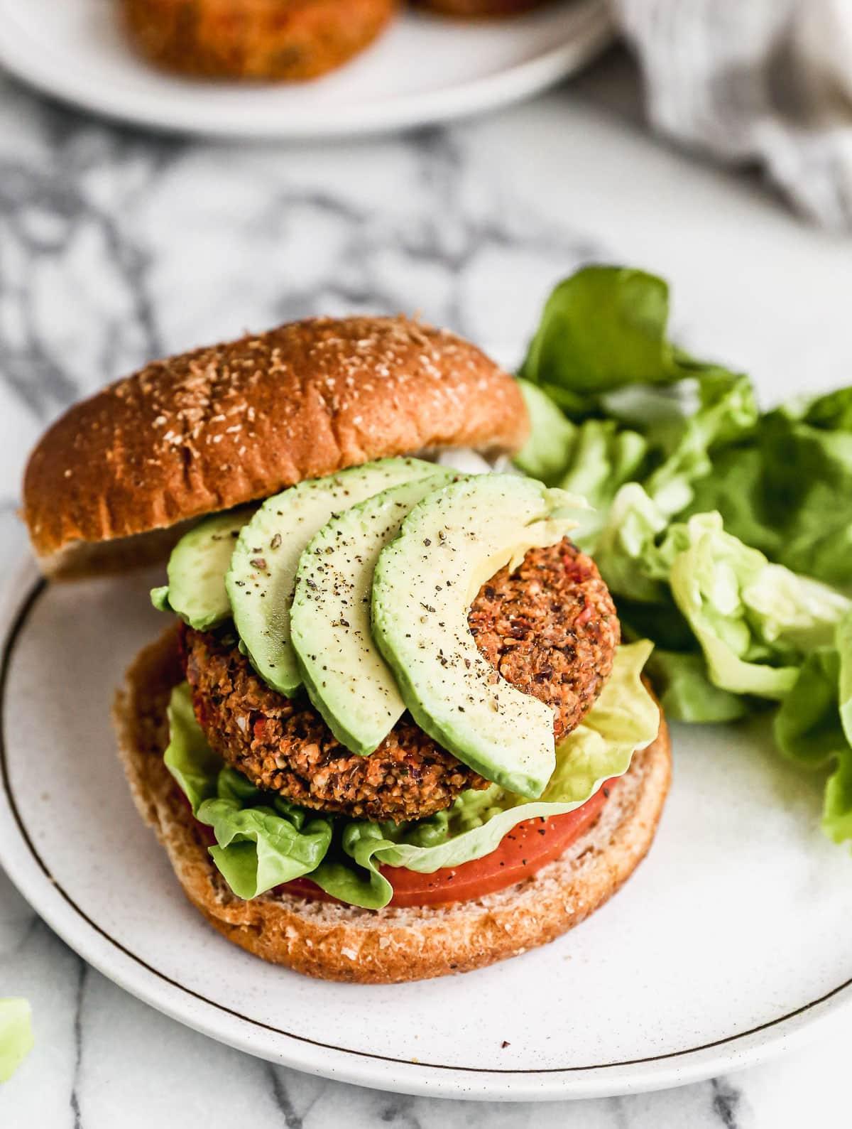 delicious vegan burger with toppings on a plate