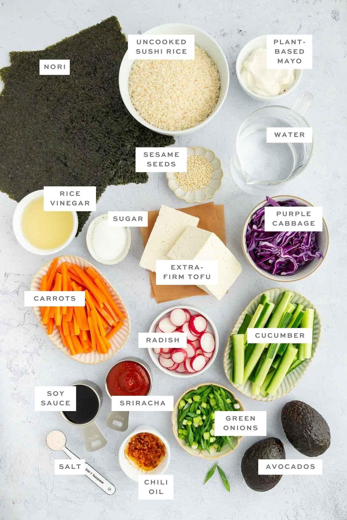 ingredients for a seaweed burrito laid out on a table
