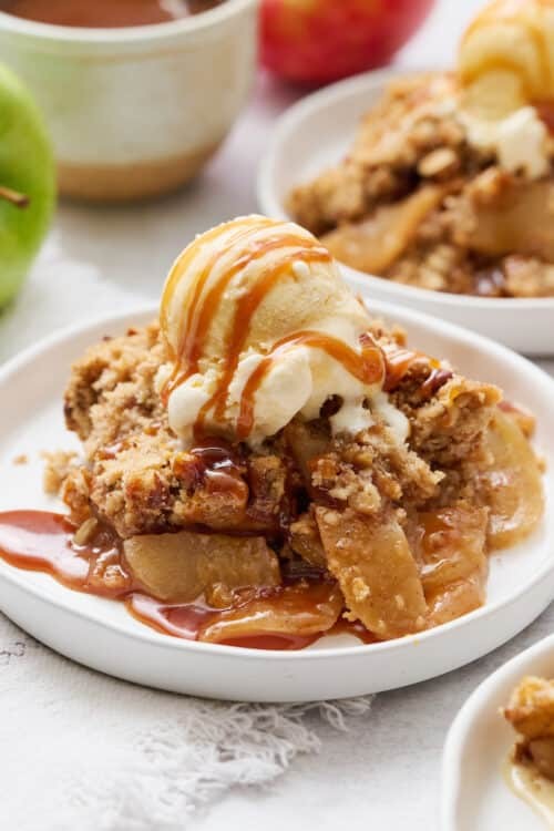 salted caramel apple crisp in baking dish, golden brown crumble topping