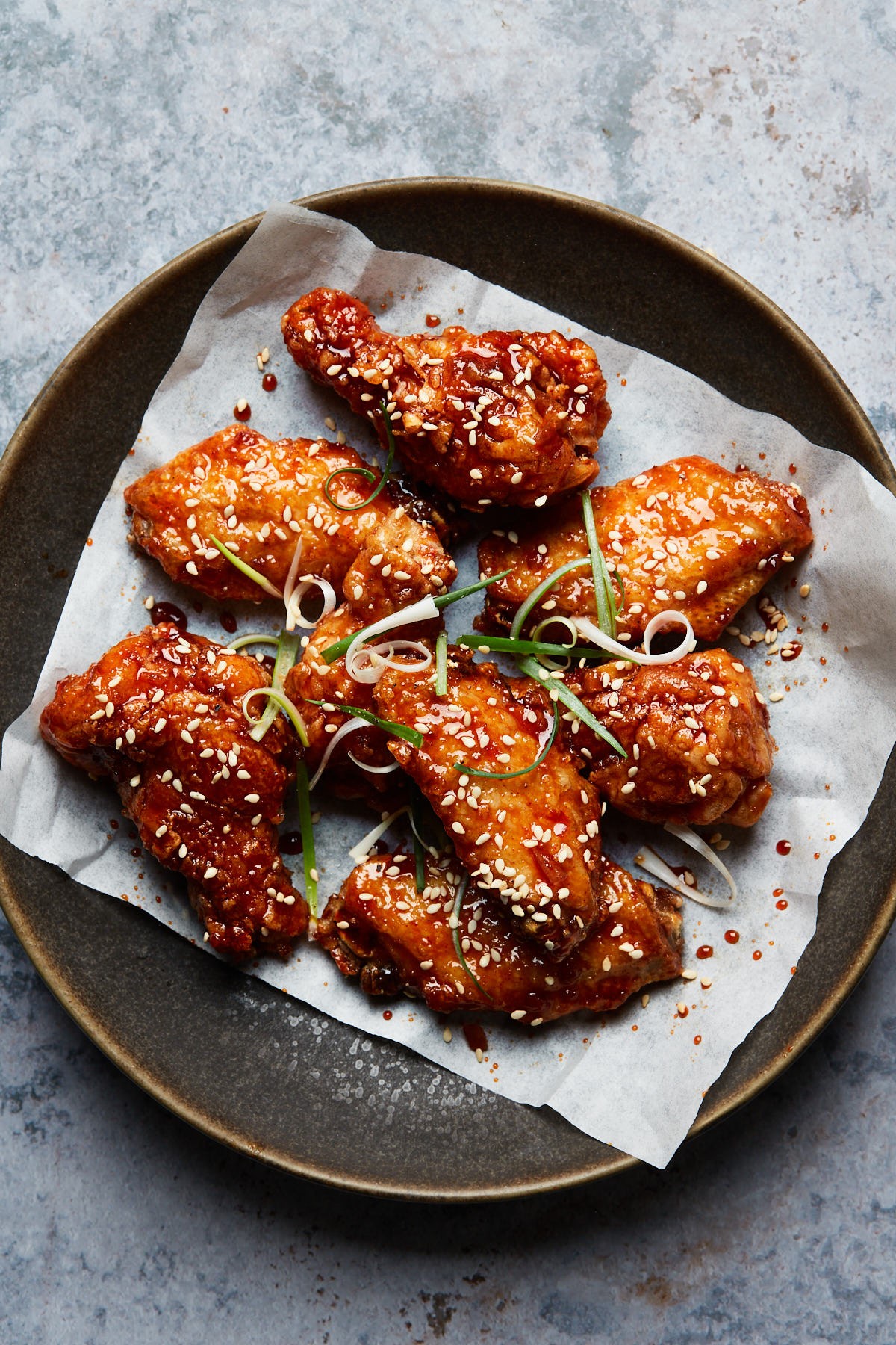 Korean fried chicken wings on a platter
