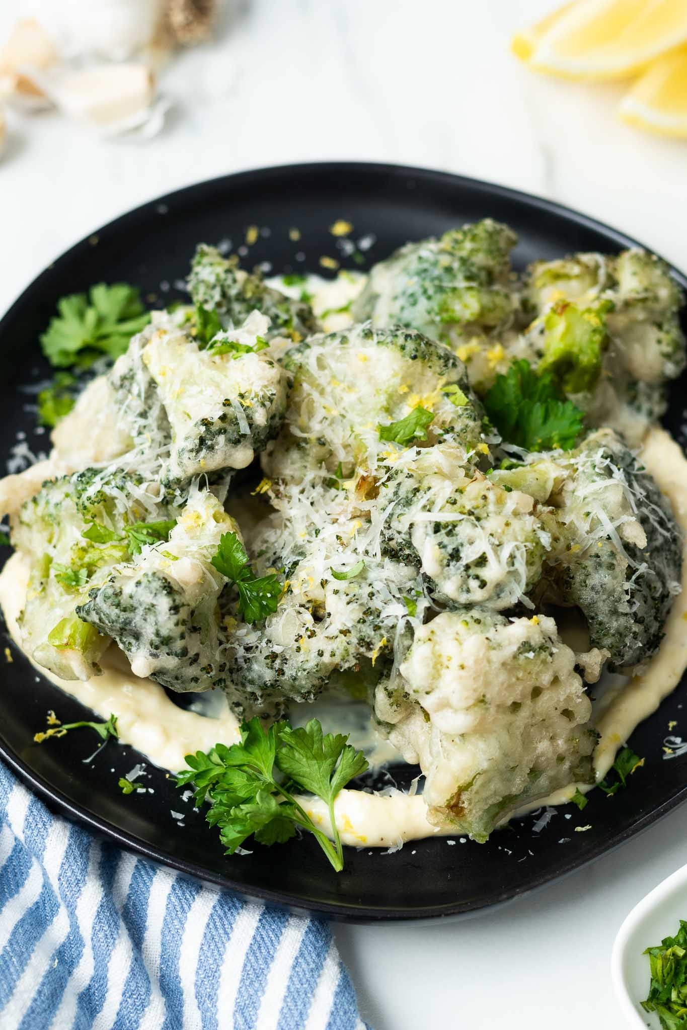 Crispy tempura-fried broccoli with a side of garlic