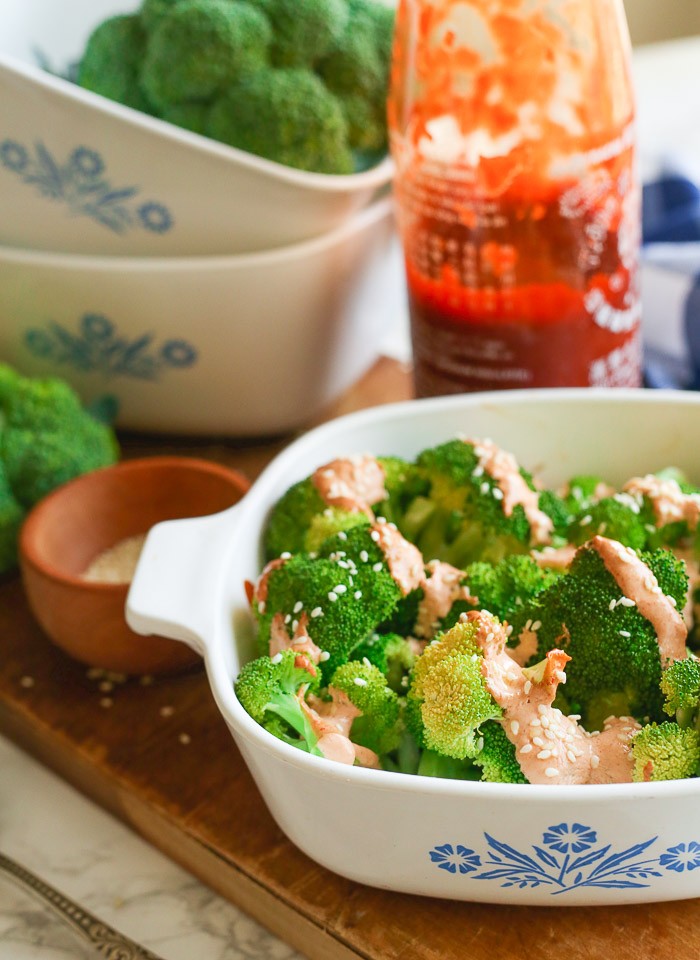 roasted broccoli florets with sriracha mayo drizzle