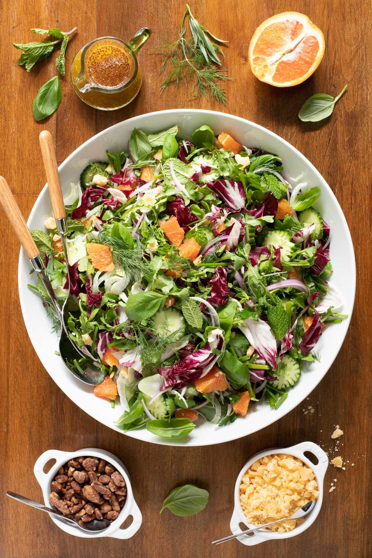 A vibrant spring citrus salad with a lemon vinaigrette dressing, garnished with fresh herbs
