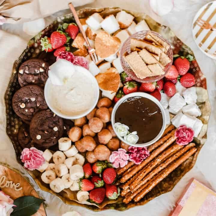 A decadent chocolate fondue with an assortment of dippers like strawberries, marshmallows, and pound cake