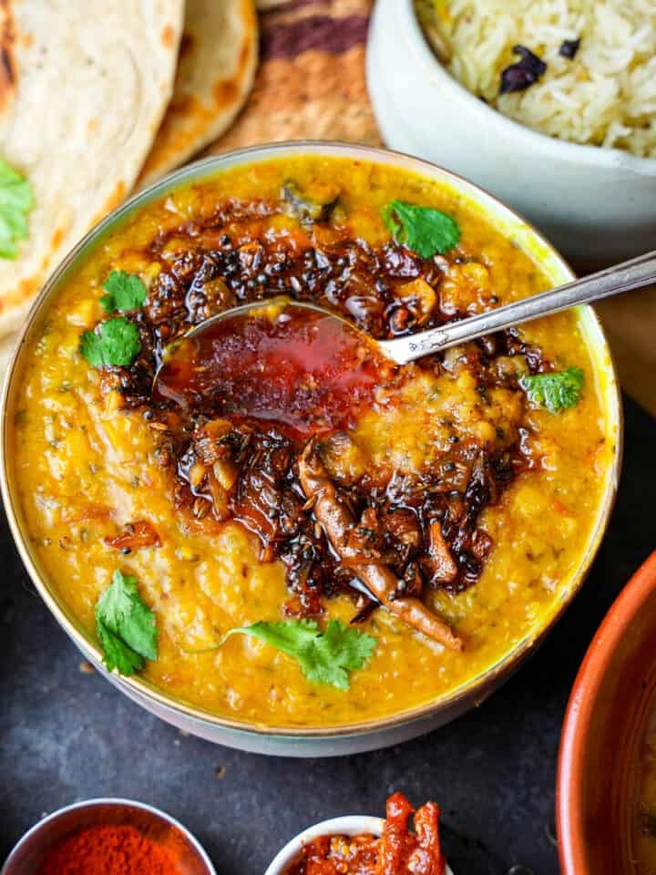 bowl of vibrant Indian dal with fresh cilantro garnish