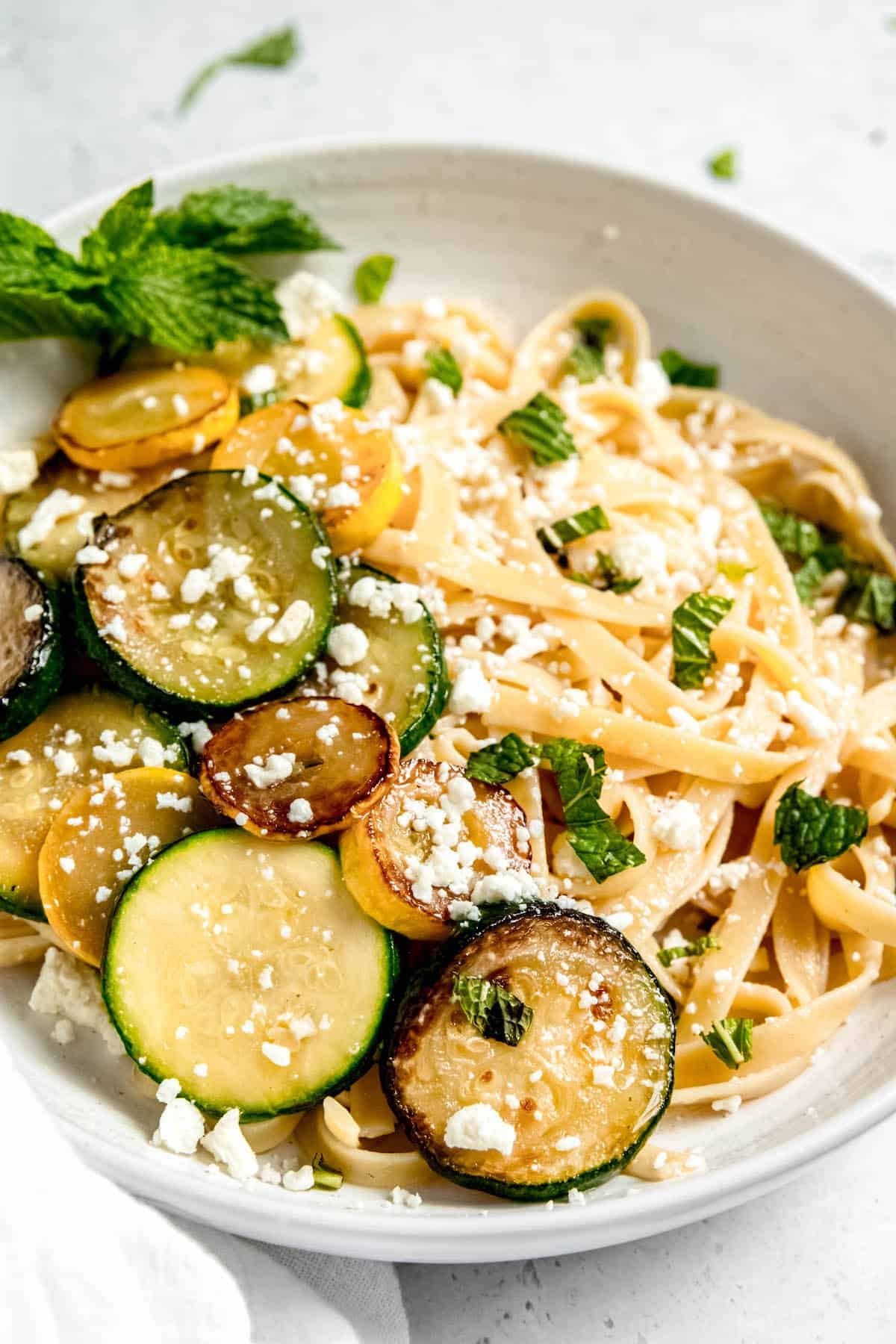 garlic zoodles with zucchini, yellow squash, and feta