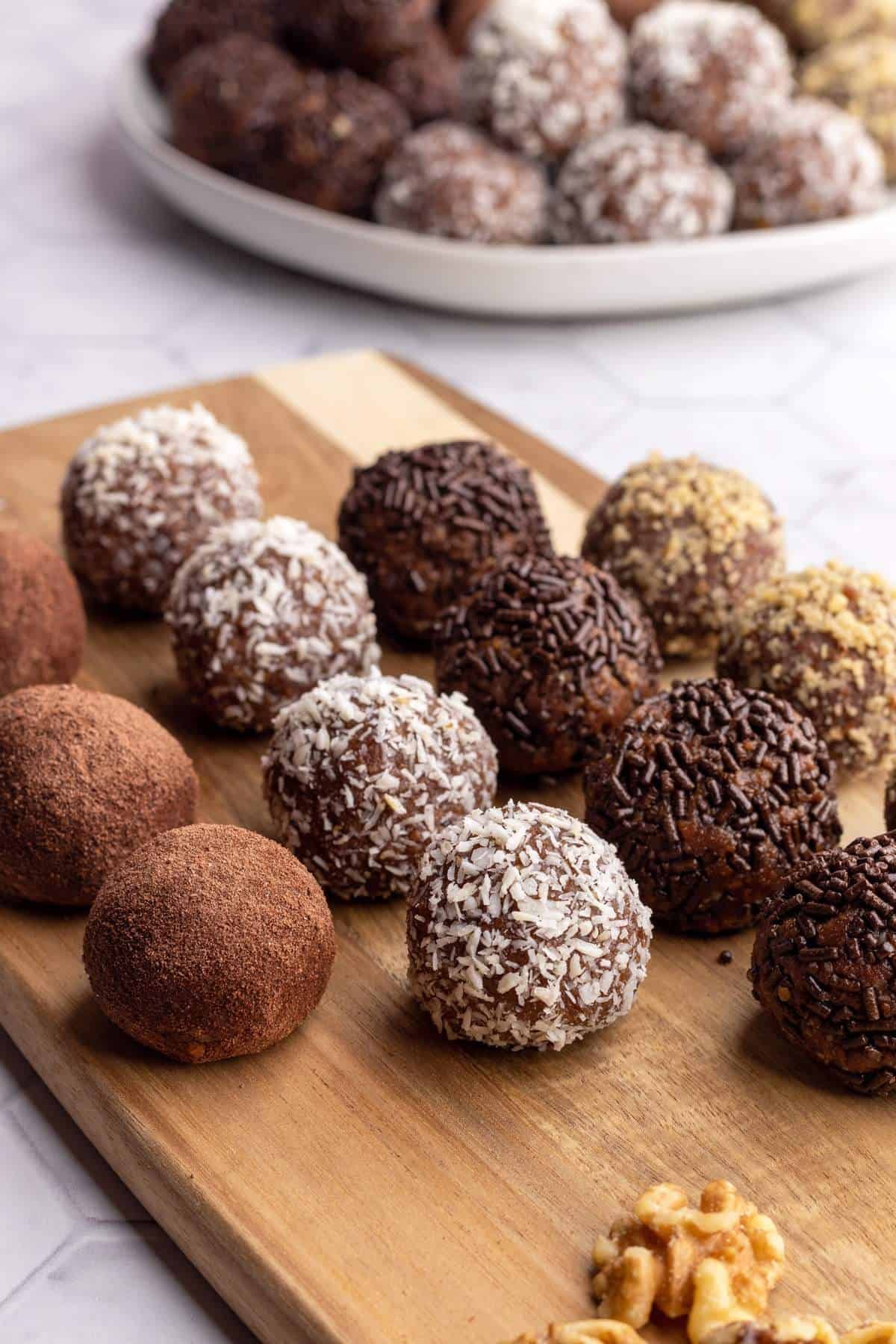 Lindt truffle energy bites on a wooden board