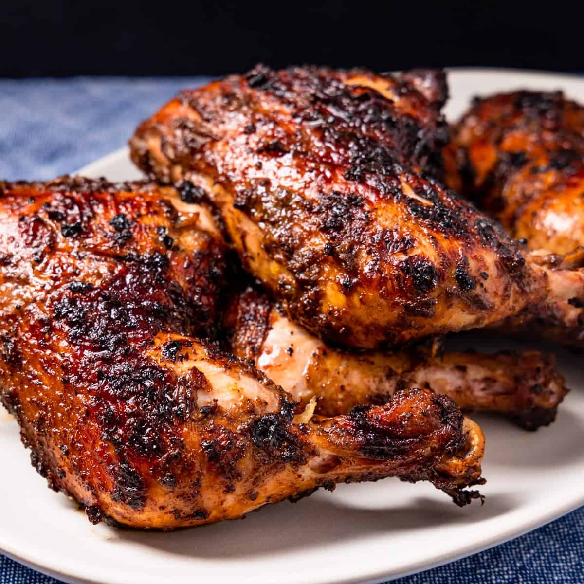 Close-up shot of delicious jerk chicken on a grill