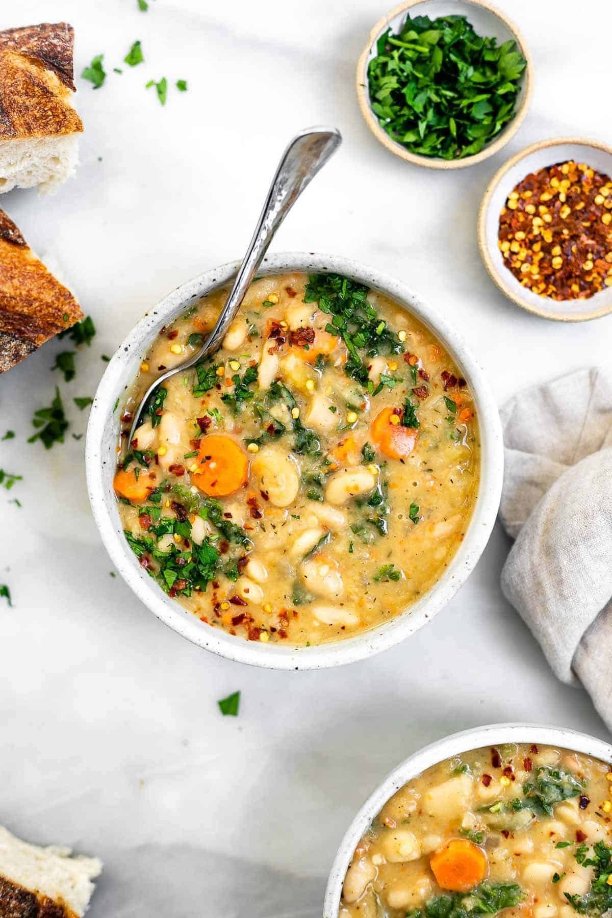 bowl of Tuscan white bean soup with herbs