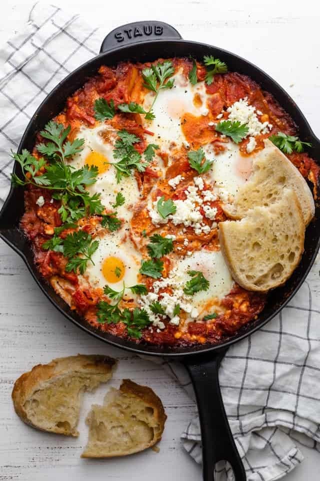 Shakshuka with Feta and Mint served in a skillet