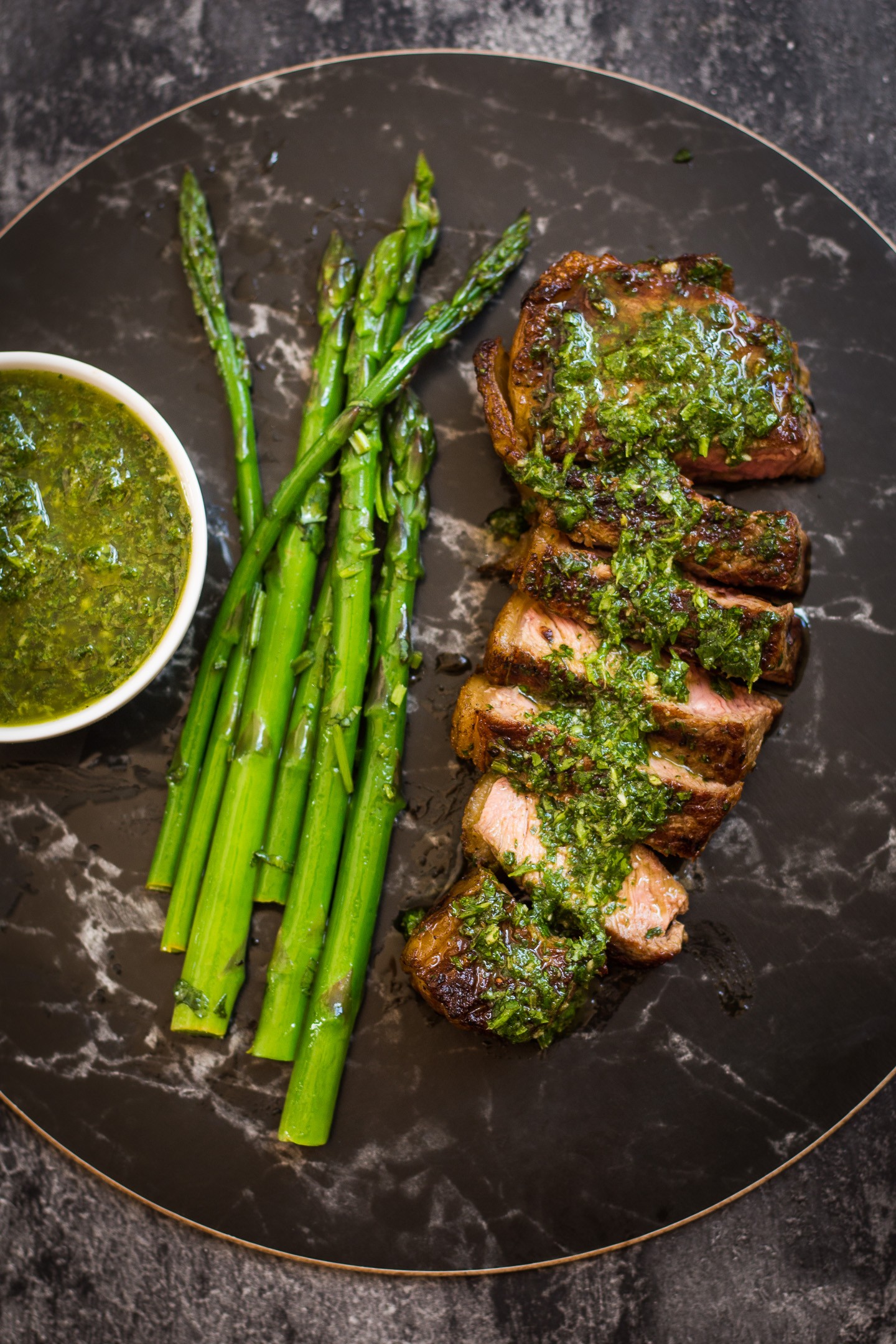 Sizzling steak with multiple sauces