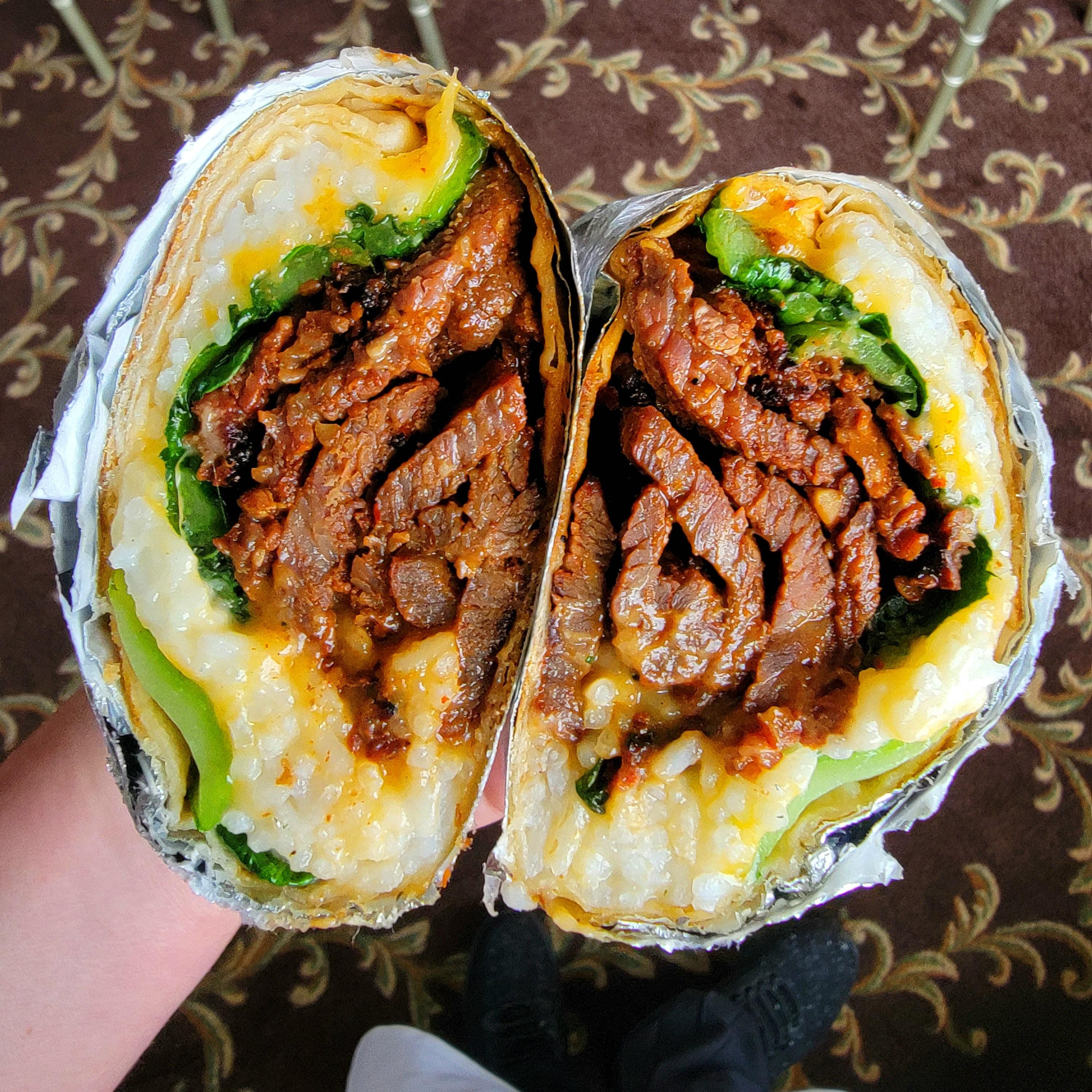 Kimchi Bulgogi Burrito cut open showing filling