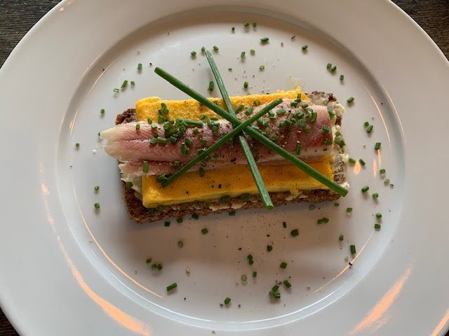 close up of danish smørrebrød with smoked eel