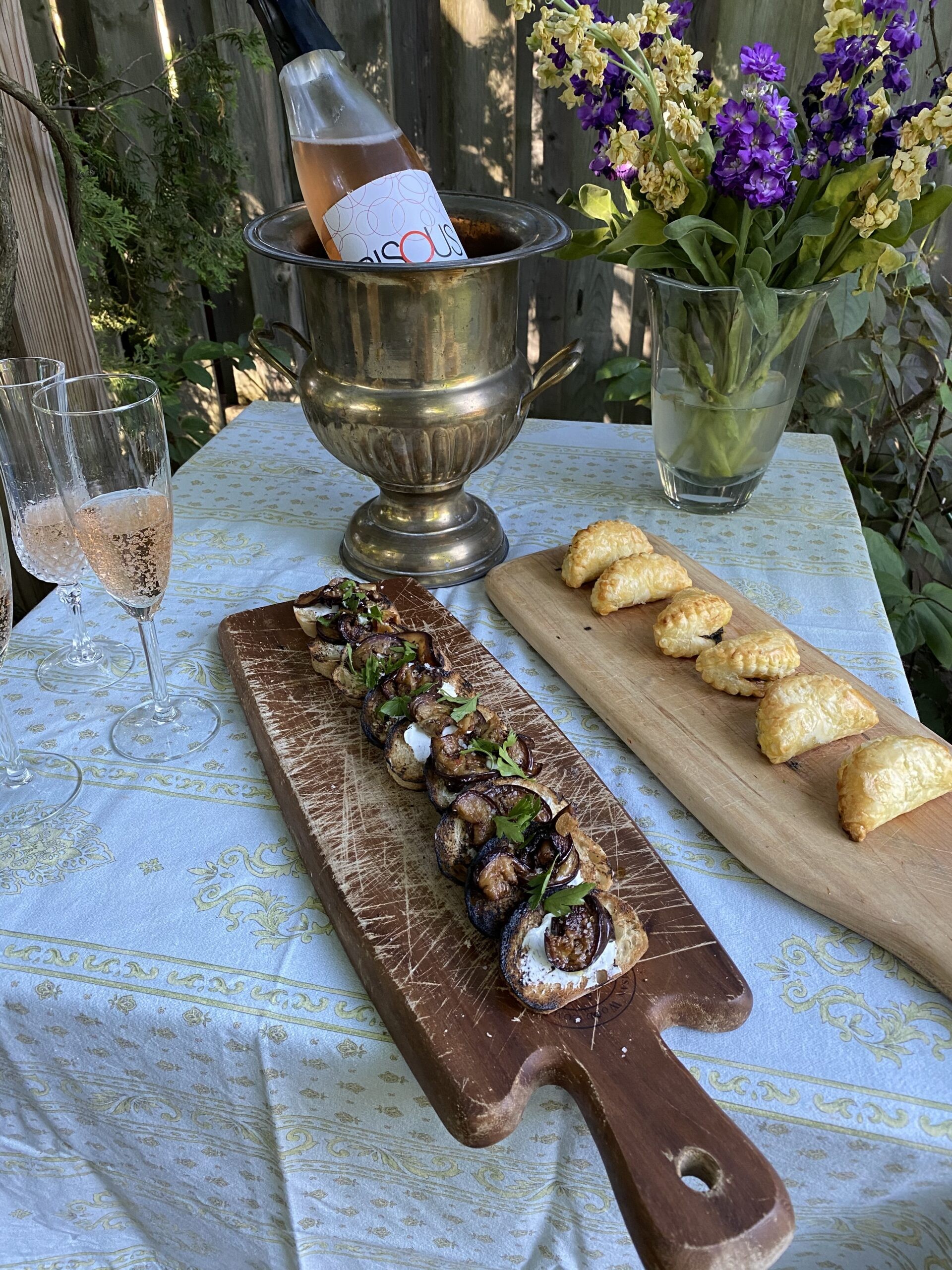 paella empanadas on a rustic wooden board