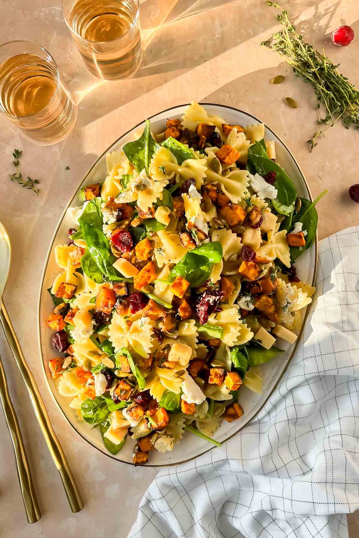 Autumn Butternut Squash Pasta Salad with toasted pepitas and parmesan cheese