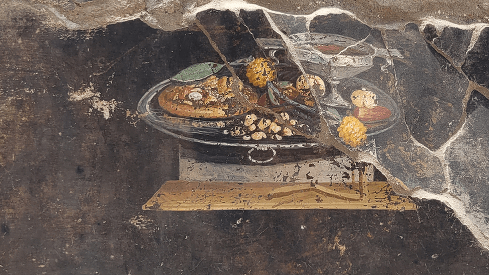 archaeologist unearthing pizza