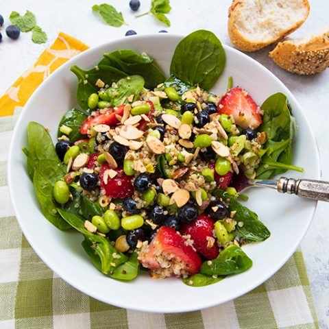 fresh strawberry spinach quinoa salad with poppy seed dressing