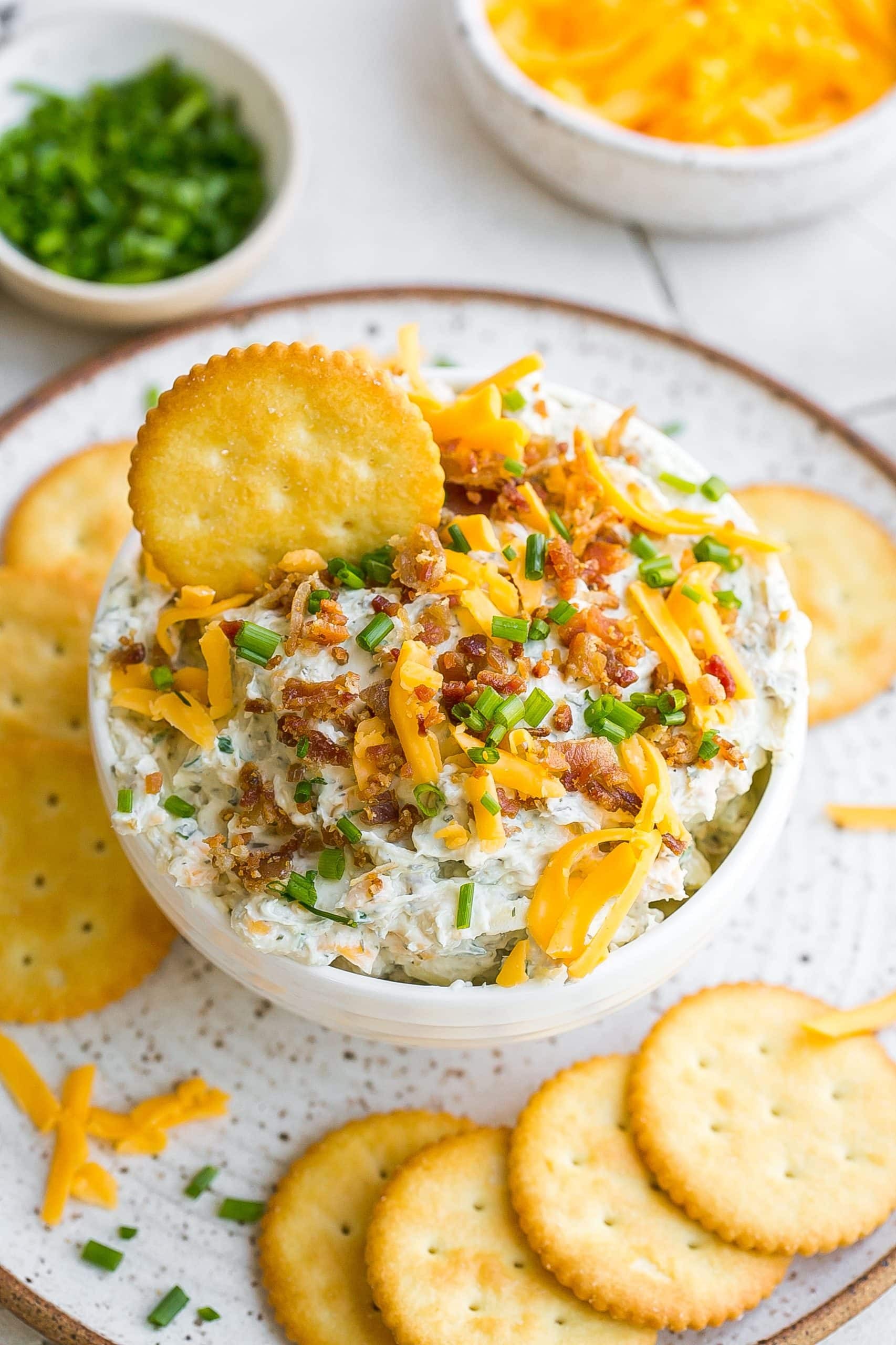 Close-up shot of creamy bacon and ranch dip with tortilla chips