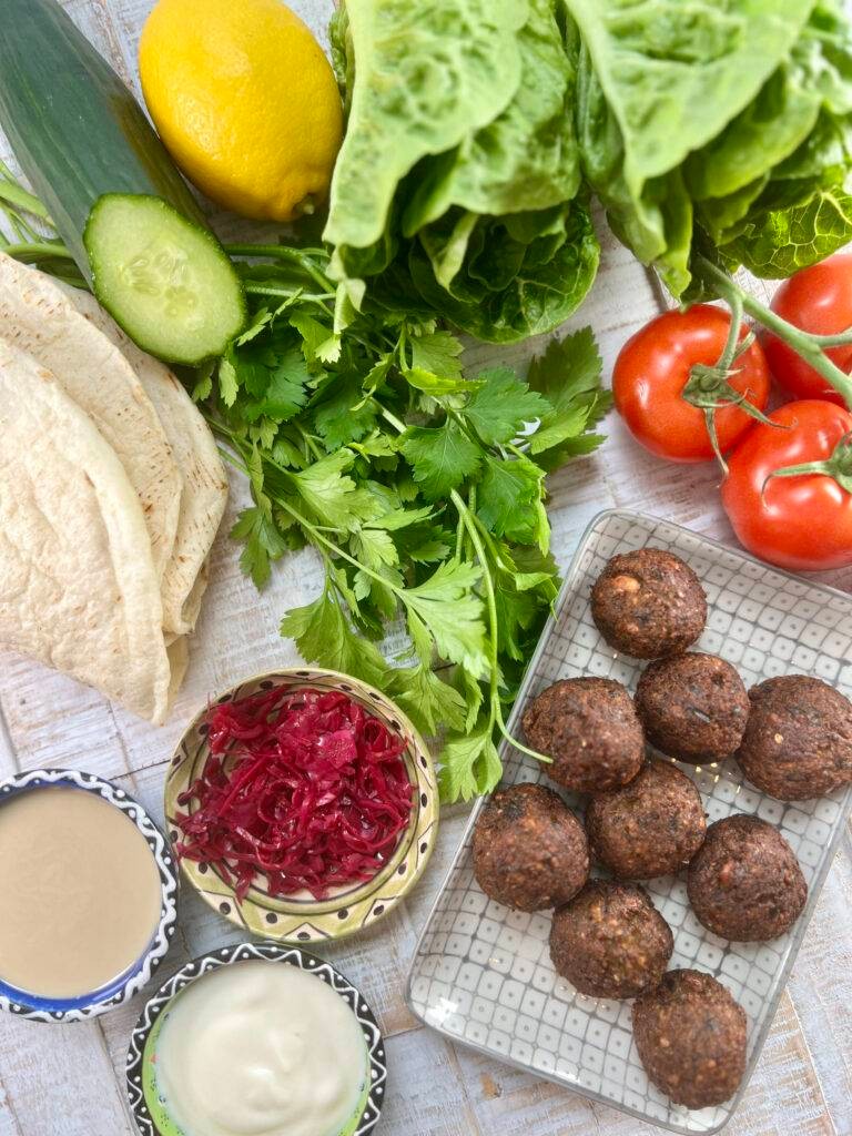 crispy falafel with vibrant pomegranate mint dressing