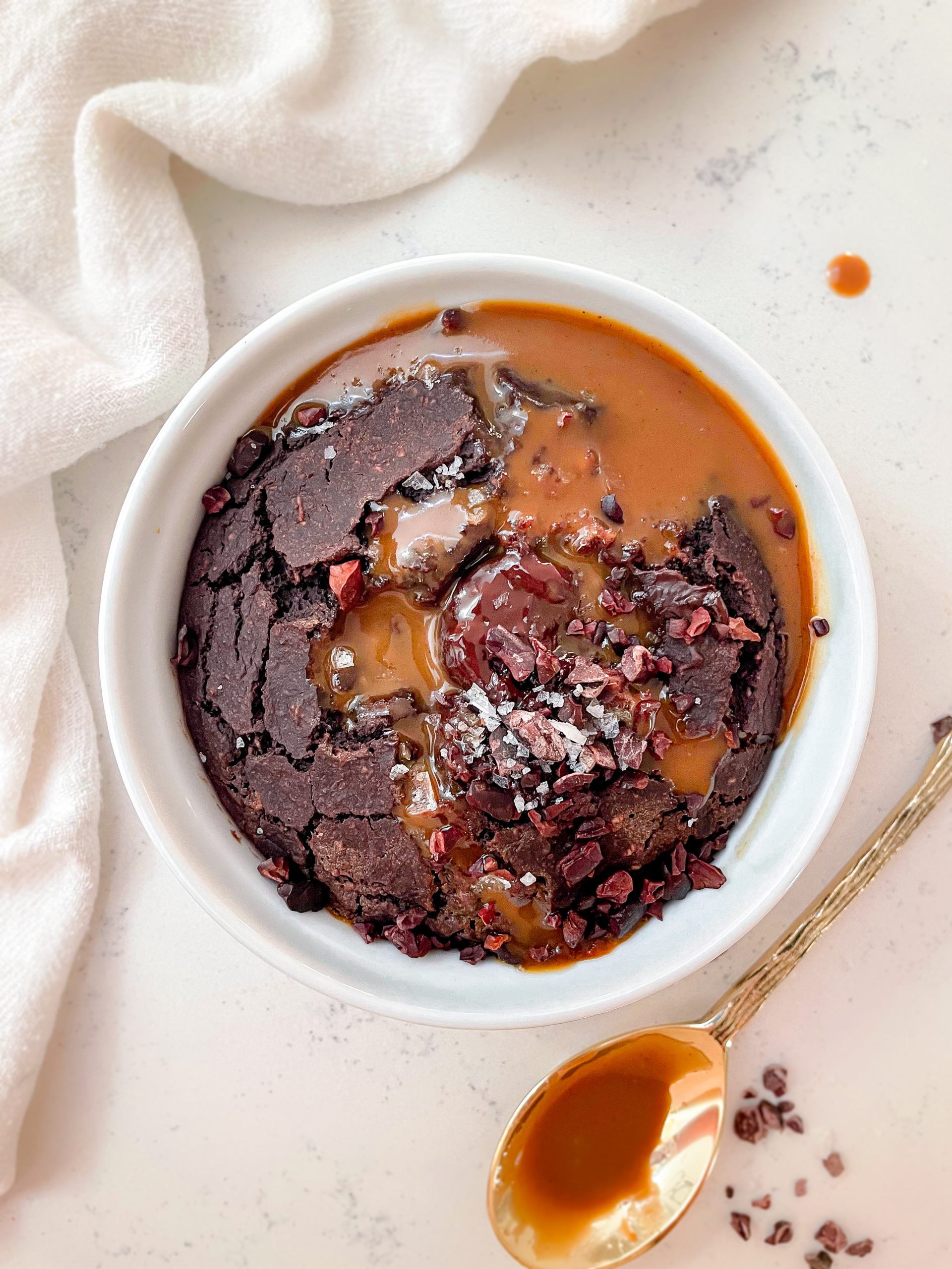 Close-up shot of a salted caramel brownie oatmeal in a baking dish