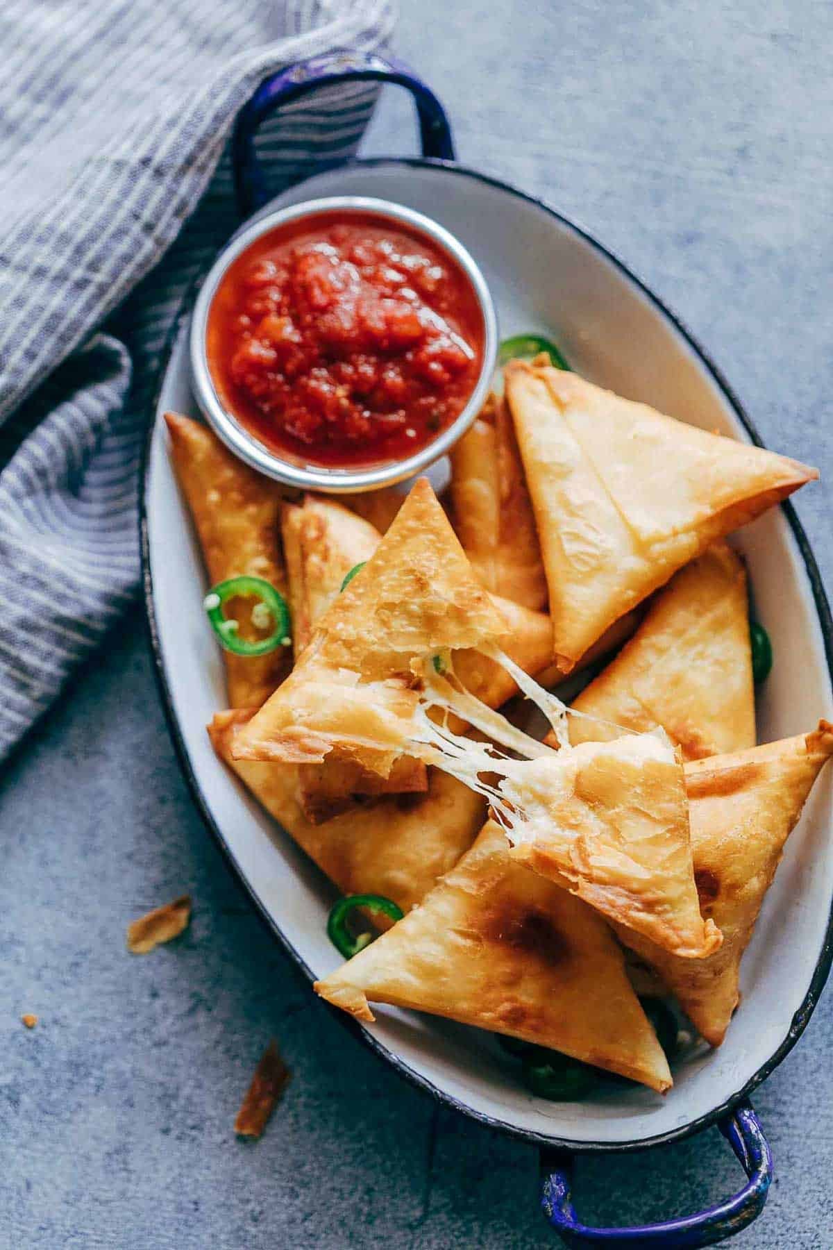 Chili Cheese Fries Samosas on a plate