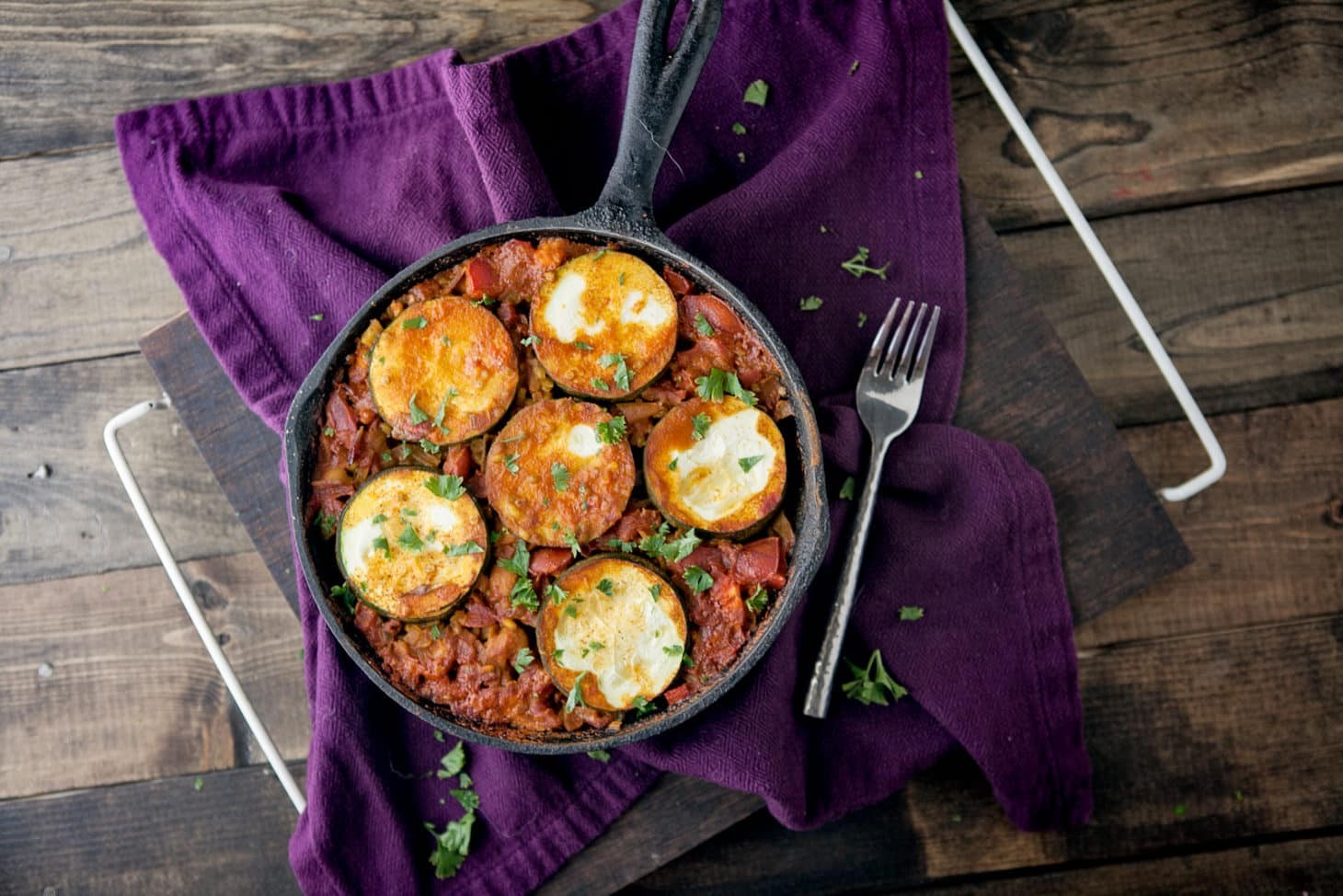 paella with zucchini and mint served in a pan
