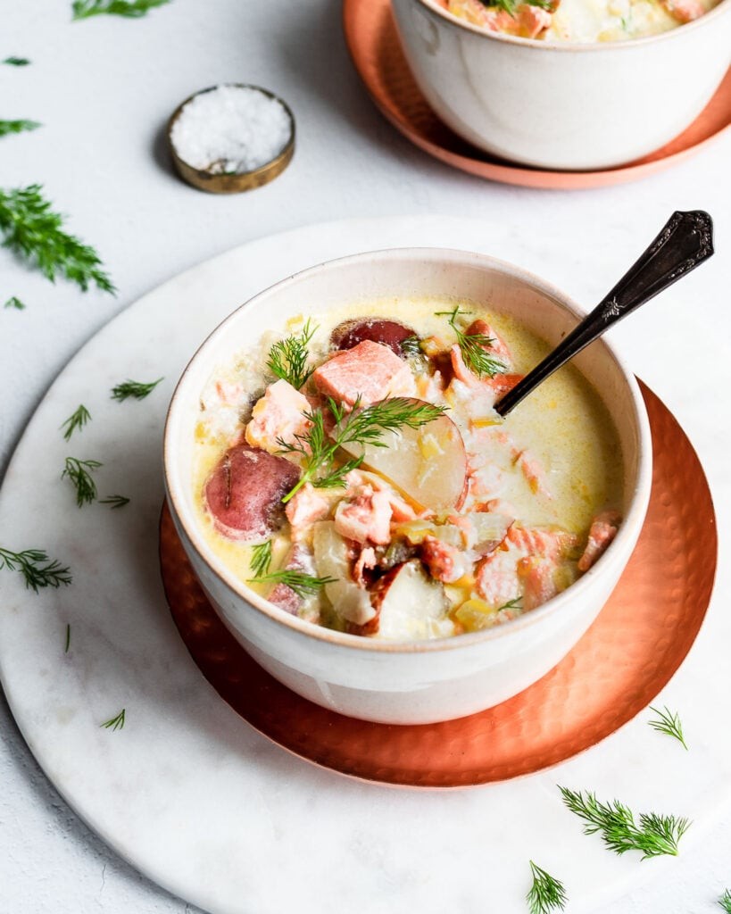 bowl of creamy smoked salmon chowder garnished with fresh dill