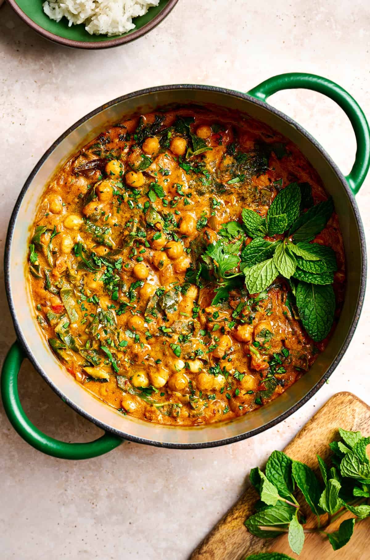 bowl of flavorful chickpea curry with fresh cilantro garnish