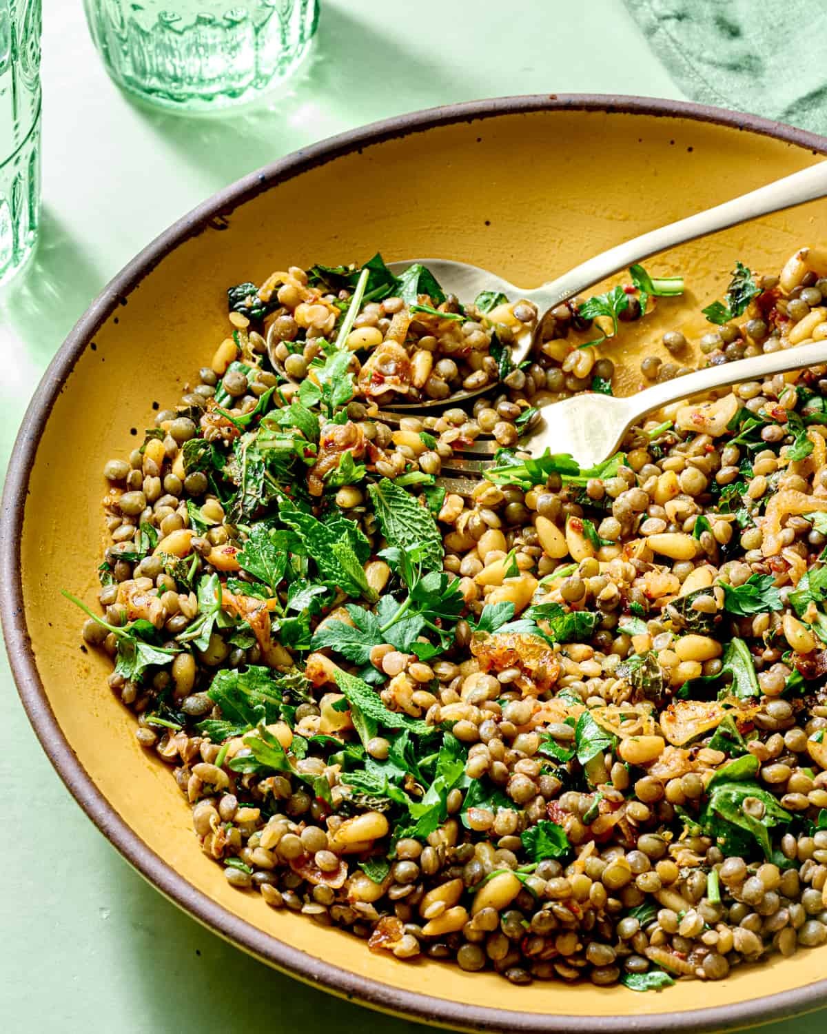 Lentil salad with lemon and herbs in a bright, rustic setting