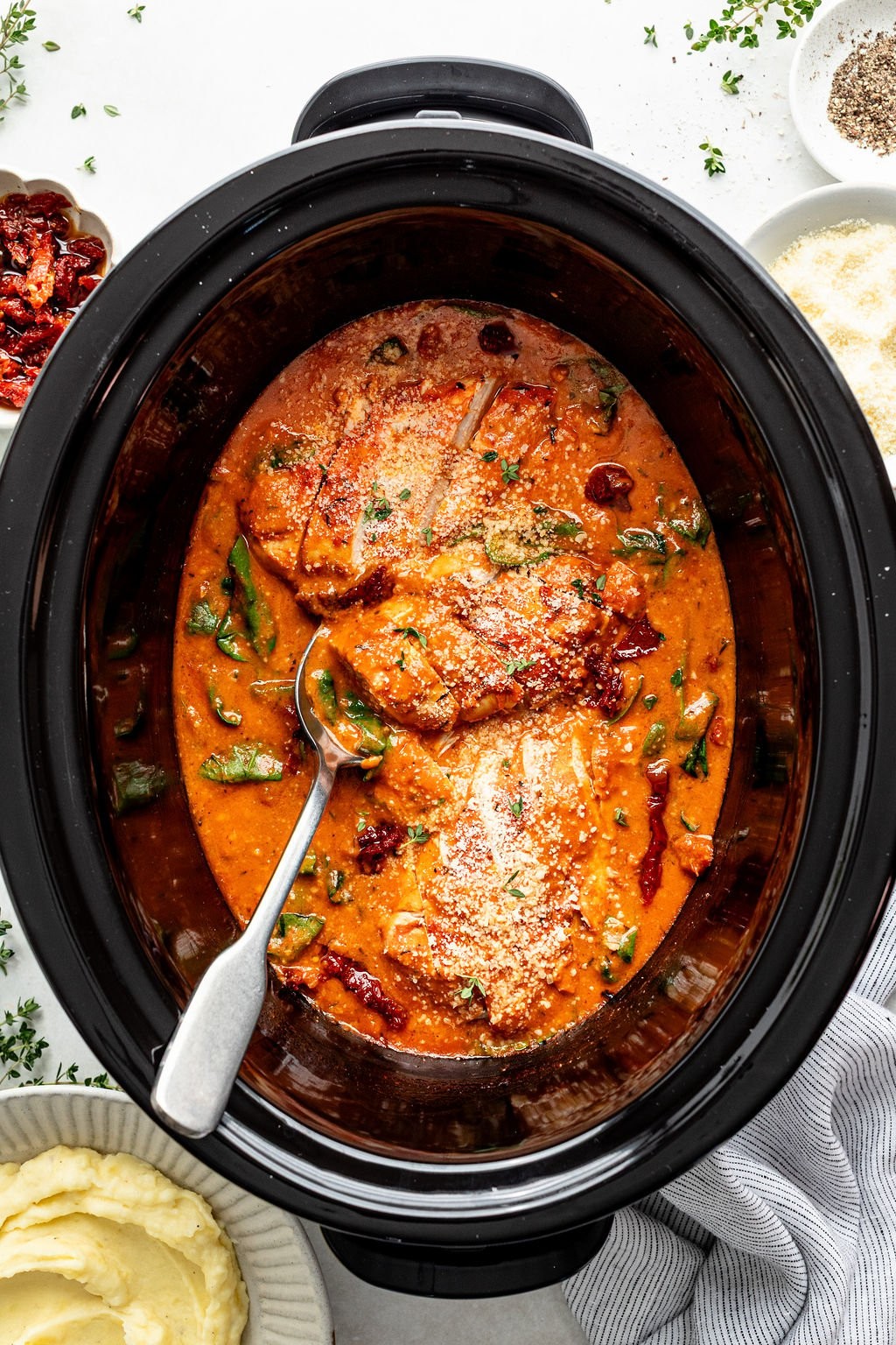 comforting crockpot creamy tomato chicken, warm kitchen scene, rustic feel
