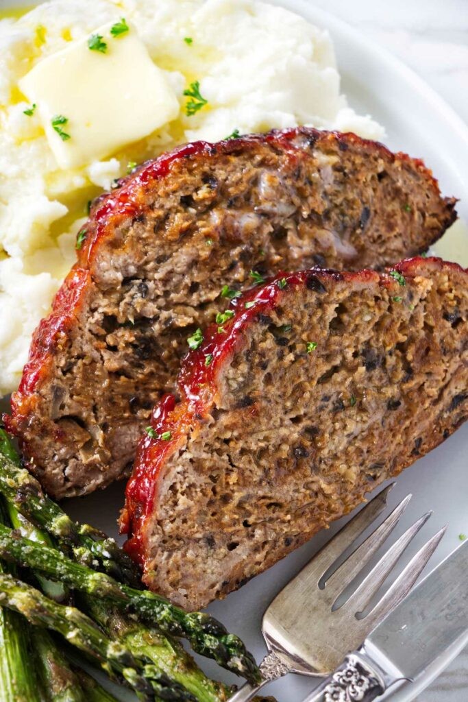 Juicy turkey meatloaf with a rich mushroom and wine sauce