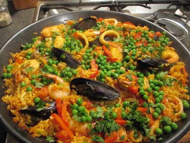 Bobotie Paella with Saffron Rice in a large pan