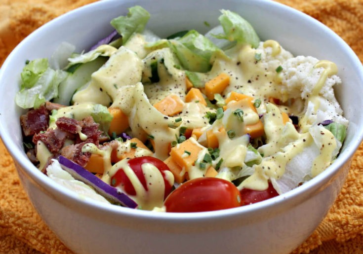 Keto Avocado and Leek Salad with Dijon Mustard dressing served in a bowl