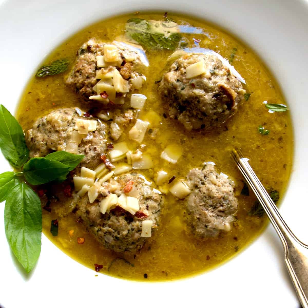 hearty bowl of Arctic Circle Albondigas Stew with a sprig of dill