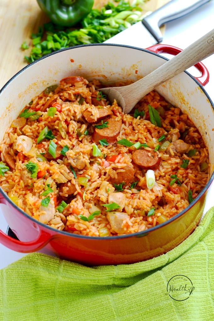 a steaming pot of Chicken Jambalaya with rice and sausage