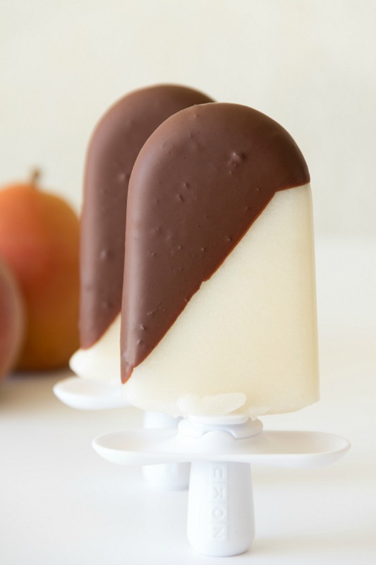 homemade pear popsicles with chocolate drizzle
