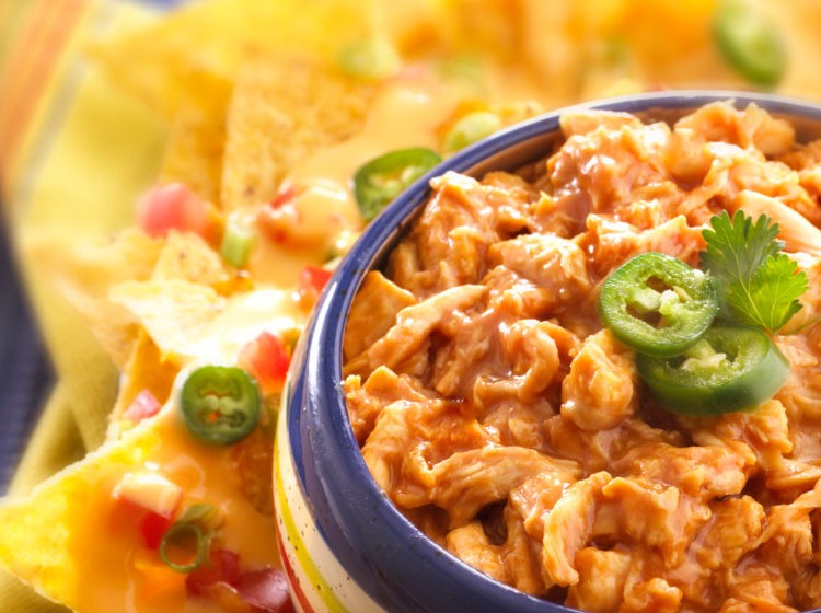 Pretzel-Crusted Buffalo Chicken Dip served with tortilla chips