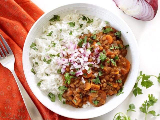 slow cooker coconut curry lentil chili served in a bowl