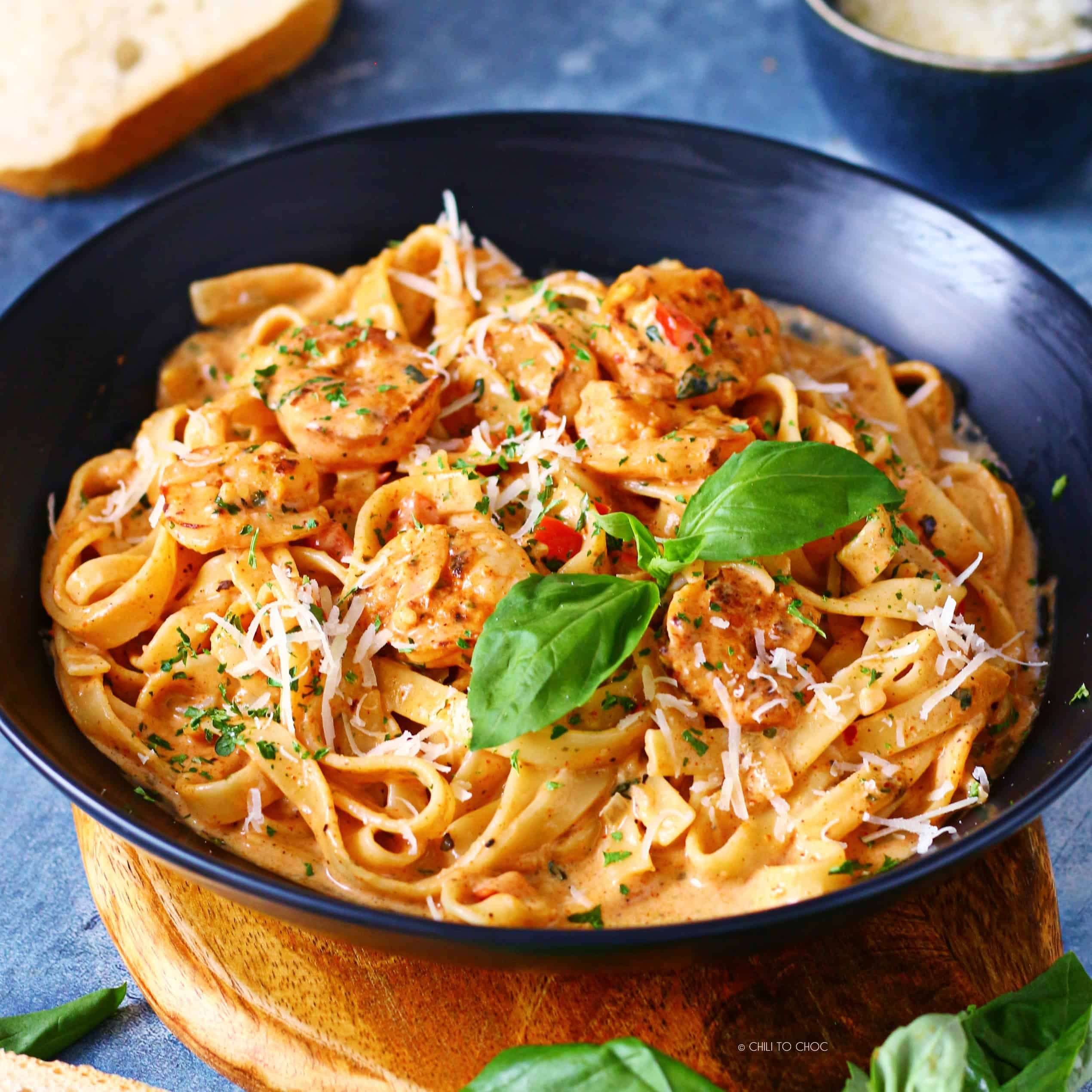 Cajun shrimp pasta in a creamy sauce, garnished with parsley