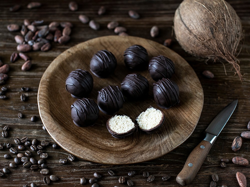 homemade bourbon bonbons on a rustic wooden surface