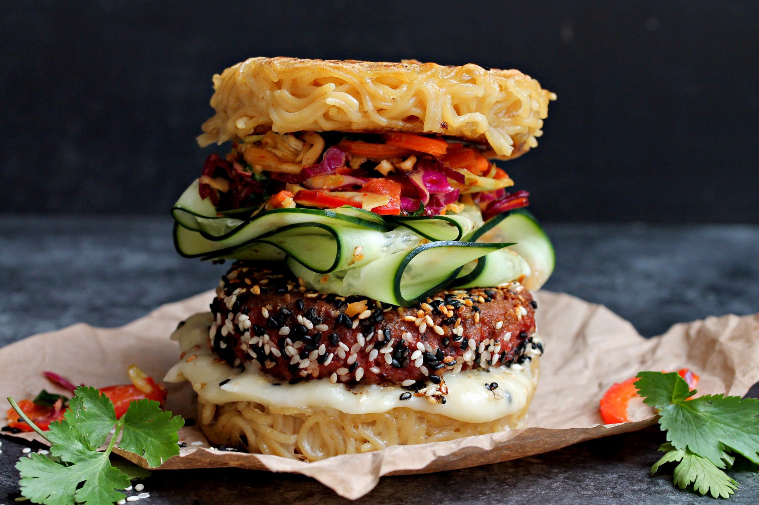balsamic glazed ramen burger with sesame seeds