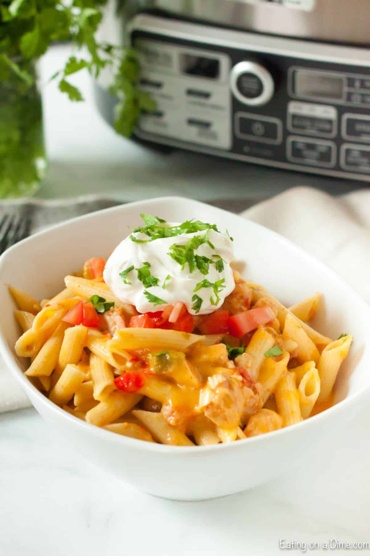 slow cooker chicken fajita pasta served in a bowl