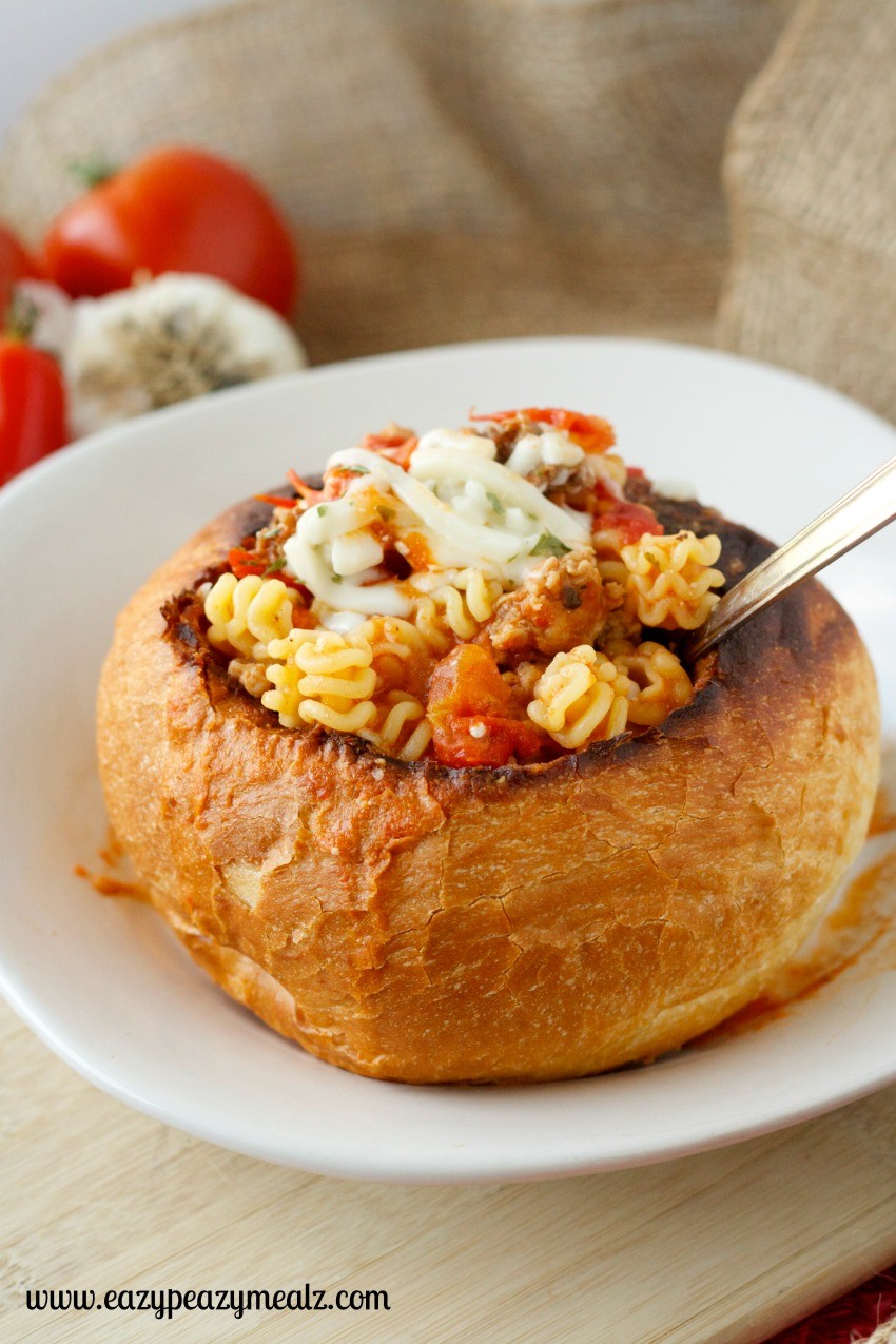 bowl of lasagna soup with bread