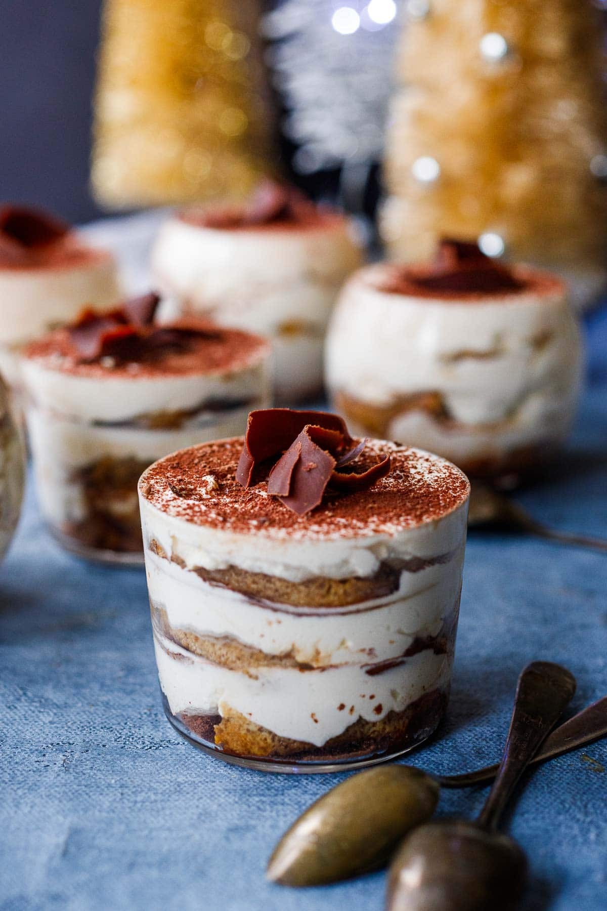 Close-up shot of deviled eggs with a tiramisu twist, showing layers of coffee-flavored filling and cocoa powder dusting.