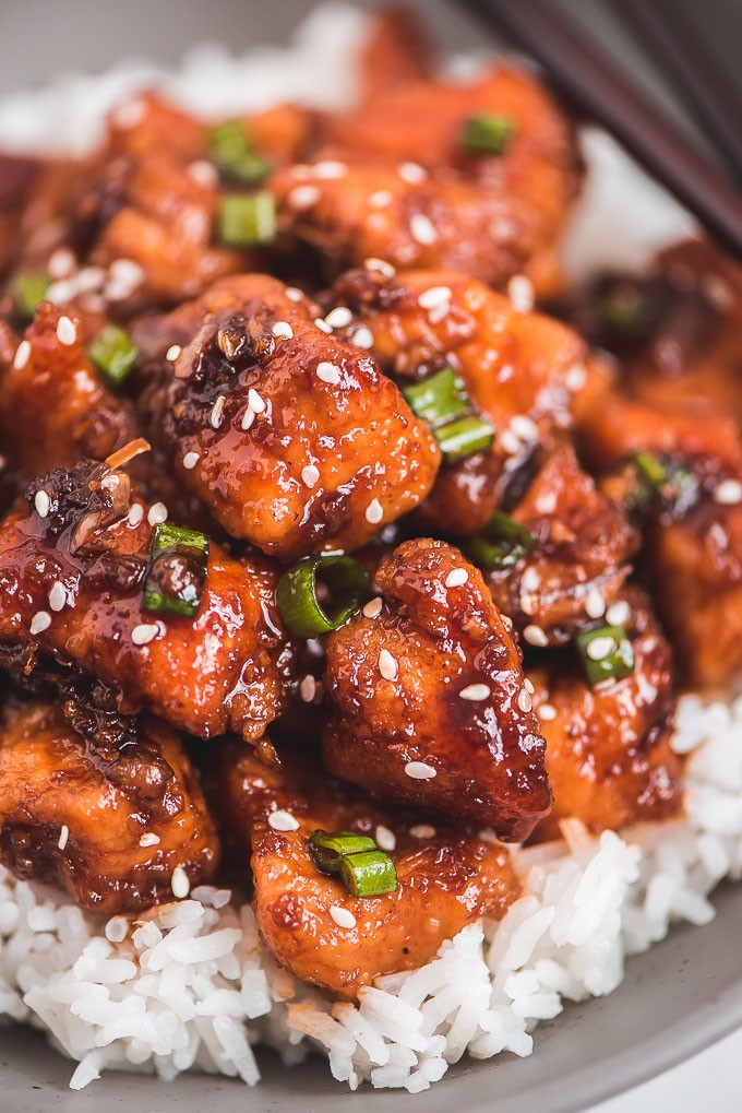Close-up shot of glistening honey garlic glazed chicken in an Instant Pot