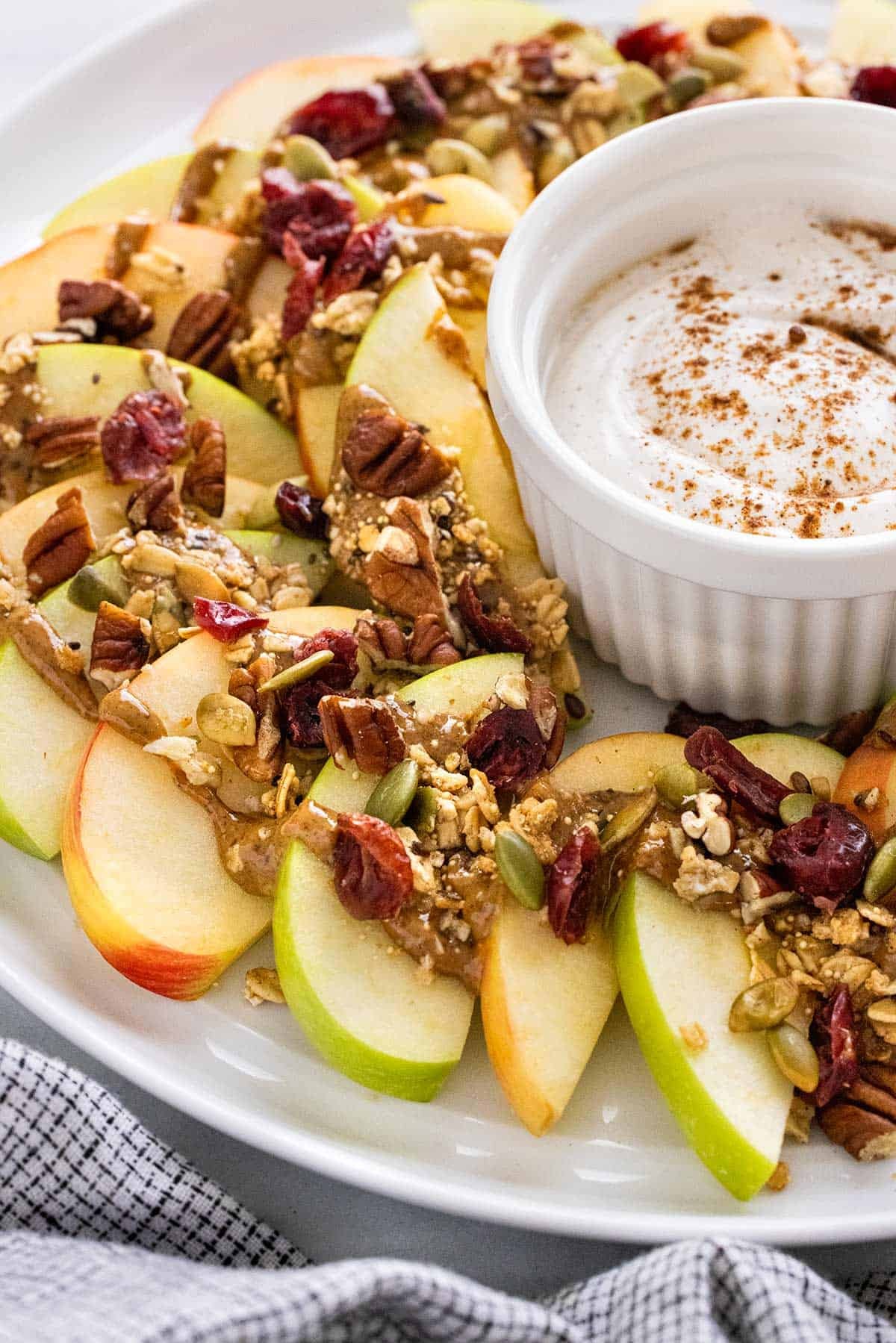 Dulce de leche apple nachos with cinnamon and chopped pecans